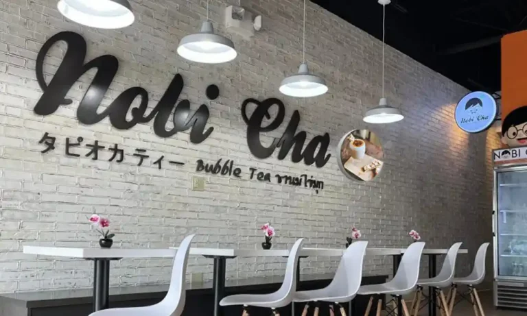 Click to view full screen installed circular LED display in Japanese style bubble tea shop for menu and promotional drink visuals